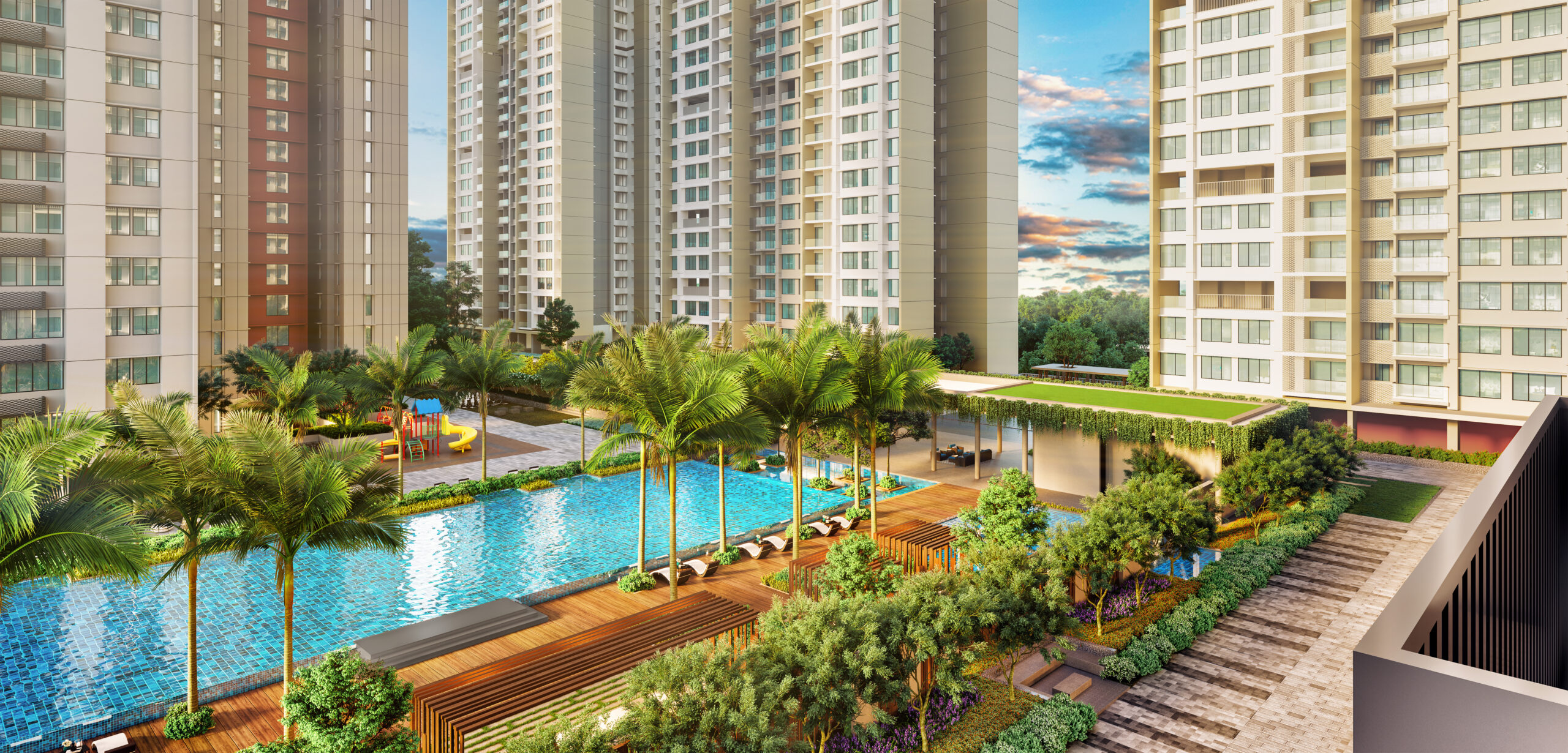 Kalpataru Parkcity Eternia swimming pool deck with palm trees and kids' play area